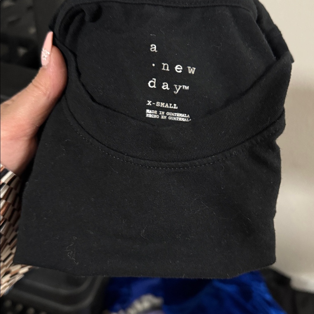 Black a new day top